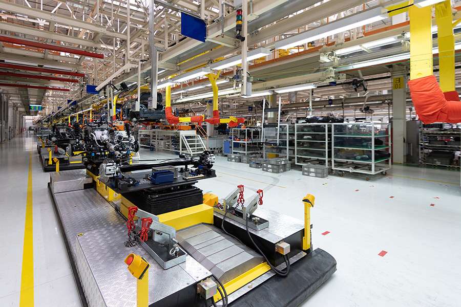 Industrial factory exterior with manufacturing equipment